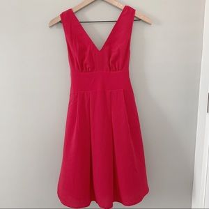 red summer dress with pleated skirt